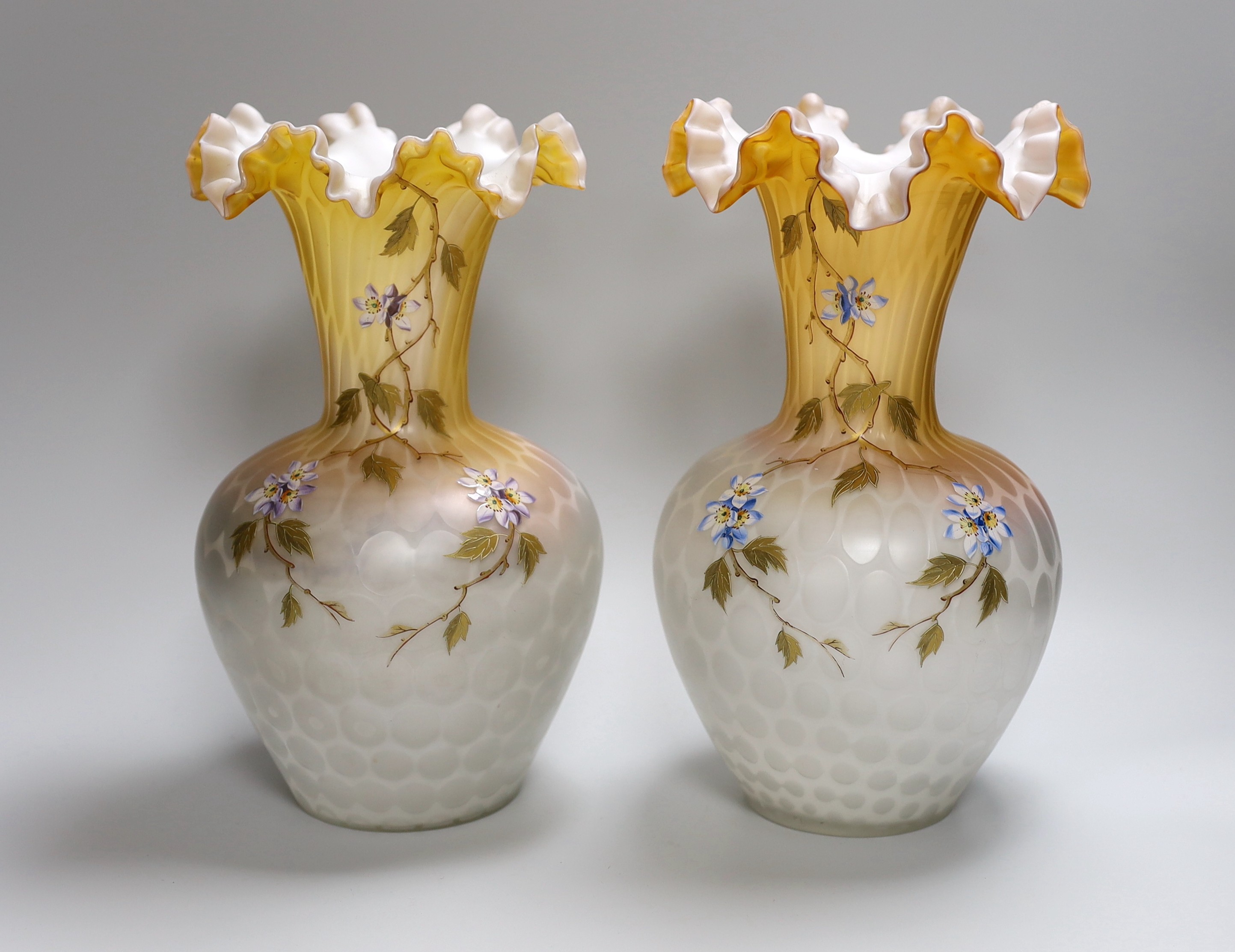 A pair of late 19th century quilted satin glass vases, 29.5cm high
